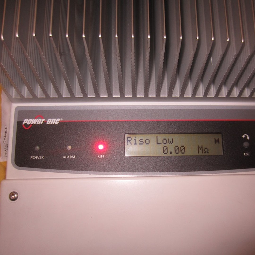 Close up view of a Aurora inverter showing a riso low fault