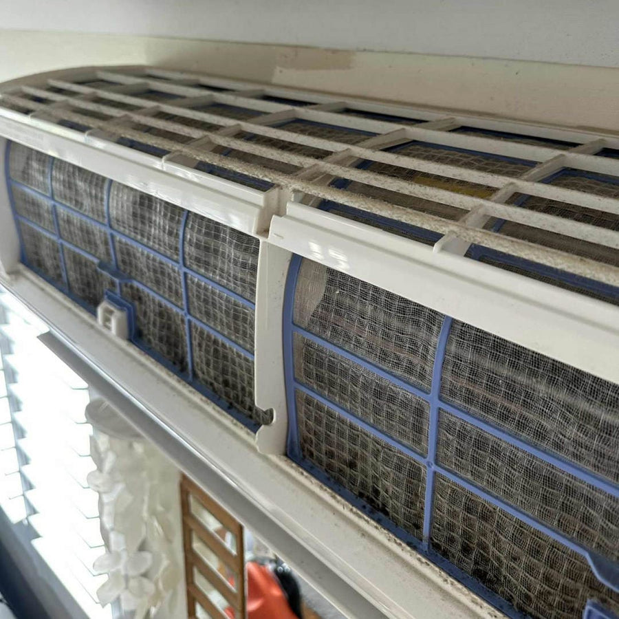 Close up of mould and dirt on a split system air conditioner in brisbane