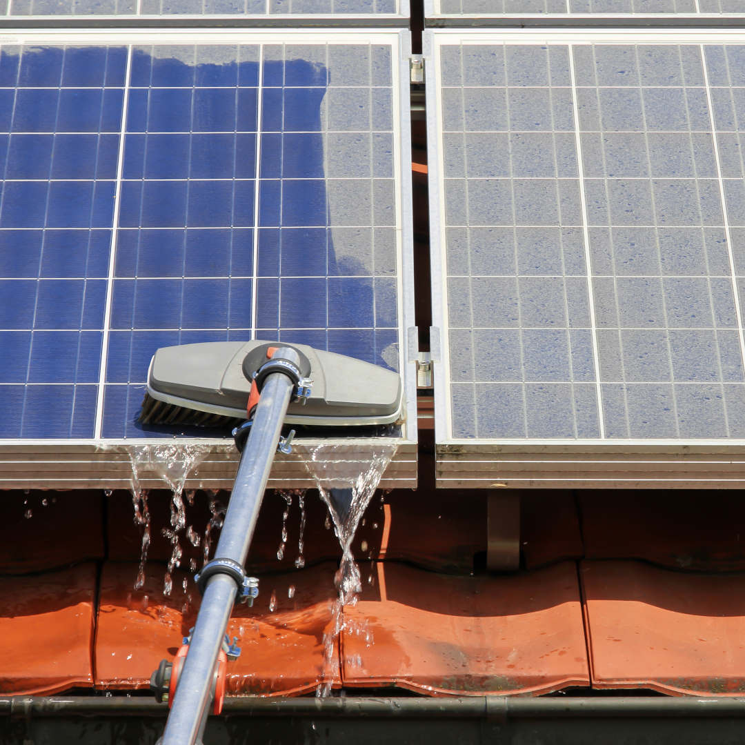 Solar panels being cleaned, both panels are very dirty