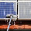 Solar panels being cleaned, both panels are very dirty
