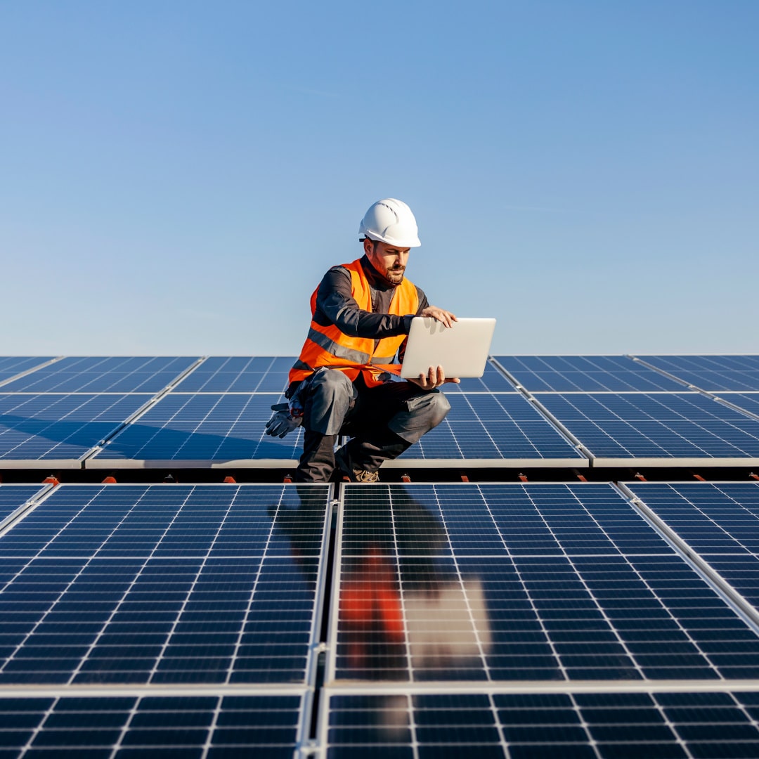 man on a roof doing a insurance inspection report for a solar system in Brisbane