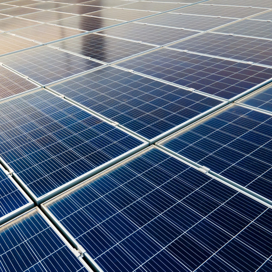 Close up view of solar panels on a roof for my blog post about feed in tariffs crashing in Brisbane and QLD